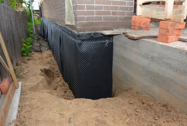 Happy homeowners after waterproofing job in Buckeye Lake